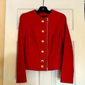 Red leather moto jacket and coordinating skirt set excellent condition.